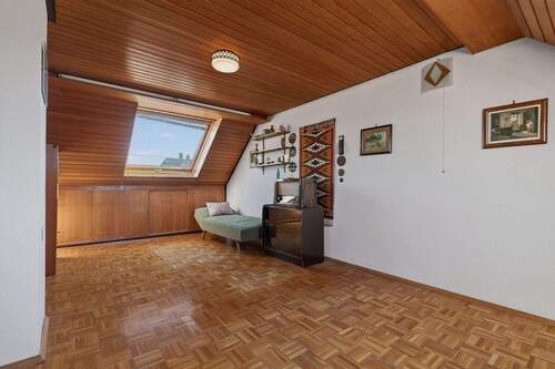 Wohnzimmer Dachgeschoss - Doppelhaushälfte mit 146,00 m&sup2; in Karlsruhe zum Kaufen