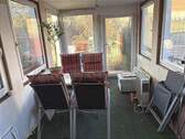 Wintergarten mit Zugang zum Garten - 