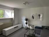 Wohnzimmer WHG Souterrain - 