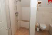 Badezimmer mit ebenerdiger Dusche - 