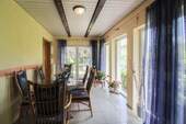 Wintergarten - Einfamilienhaus mit 156,10 m&sup2; in Timmaspe zum Kaufen