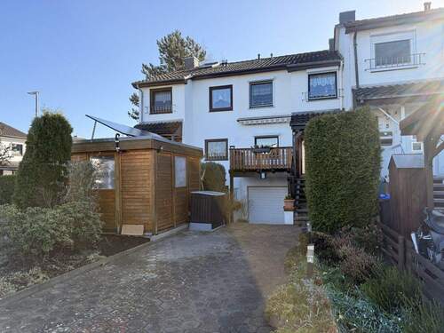 ...Hofeinfahrt mit Garage - Reihenmittelhaus mit 73,10 m&sup2; in Weyhe zum Kaufen