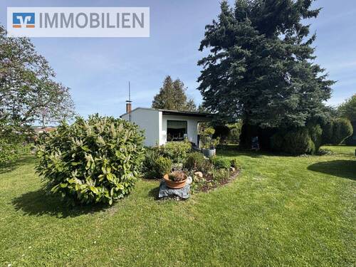 Gartenansicht - In traumhafter Lage befindet sich dieses 1000 m² gepflegte Gartengrundstück