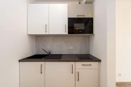 Die voll ausgestattete Küche - 1 Zimmer Etagenwohnung in Sellin