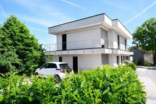 Seitenansicht - Mehrfamilienhaus, Wohnhaus mit 269,60 m&sup2; in Solingen zum Kaufen