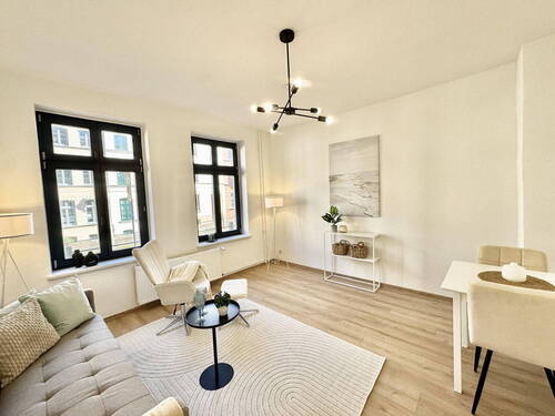 Wohnbereich - Sofort bezugsfrei: Modernisierte 2-Zimmer-Wohnung mit Terrasse in Wismars Altstadt