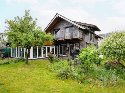 Rückansicht des Hauses mit Garten - 4 Zimmer Einfamilienhaus zum Kaufen in Diepholz