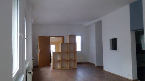 Wohnzimmer mit Eingang - Loft-Wohnung mit großer Dachterrasse 