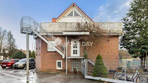 Außenansicht 1 - Großzügiges MFH mit 3 Wohneinheiten, Garage, Dachterrasse, Garten und 604 m² Grundstück in Lohne