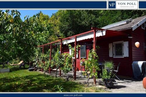 Hausansicht Süden - Betriebsurlaub bis 06.01.26. Ab 07.01.26 sind wir wie gewohnt für Sie da! - Idyllisch gelegenes Grundstück mit Wochenendhaus, Einbauküche, Duschbad, P