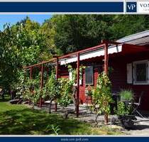 Betriebsurlaub bis 06.01.26. Ab 07.01.26 sind wir wie gewohnt für Sie da! - Idyllisch gelegenes Grundstück mit Wochenendhaus, Einbauküche, Duschbad, P - Ansbach