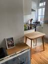 Wohnraum mit Blick zur offenen Küche - 