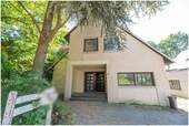 Frontansicht - 6 Zimmer Mehrfamilienhaus, Wohnhaus zum Kaufen in Tornesch