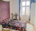 Schlafzimmer mit Zugang zum Balkon - 