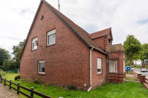 Seitenansicht - Einfamilienhaus mit 256,40 m&sup2; in Lauenbrück zum Kaufen