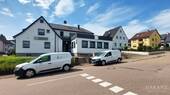 20240814 113307.2 - Modernisiertes Mehrfamilienhaus mit vier Wohneinheiten, Garagen und Stellplätze