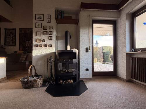 Wohnbereich mit Ofen - 