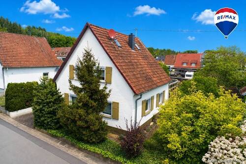 RE/MAX Immobilien DeLux Haus in Mettlach zu verkaufen - 6 Zimmer Einfamilienhaus zum Kaufen in Mettlach / Keuchingen