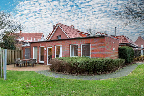Hausansicht Garten - Mittendrin im Grünen: Traumhaus mit vier Wohneinheiten am Park