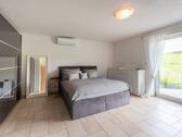 Schlafzimmer mit Balkon - 