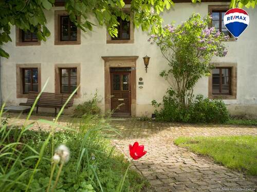 REMAX Immobilien DeLux Einfamilienhaus Frontansicht Blieskastel Mark Matthias Borowicz - Historisches Wohnhaus in idyllischer Lage von Blieskastel-Wolfersheim