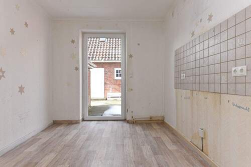 Küche mit Zugang zur Westterrasse - 