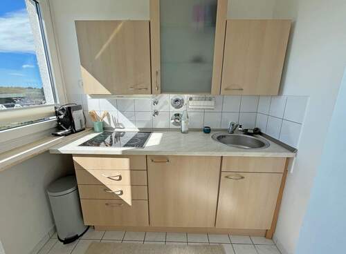 Küche mit Einbauküche - Etagenwohnung mit 27,60 m² in München zum Kaufen