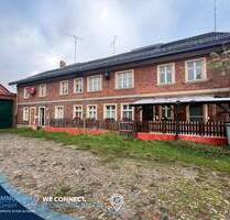 Vierseitenhof mit 5 WE und Garagen in Heeren - Stendal