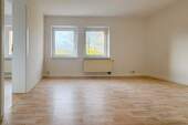 Wohnzimmer - Raus aus dem Trubel: Helle Wohnung im grünen Wohnumfeld!