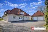 Objektansicht - Großzügiges Zweifamilienhaus mit Doppelgarage auf weitläufigem Grundstück in Hahn-Lehmden (Obj.-Nr. 6605)
