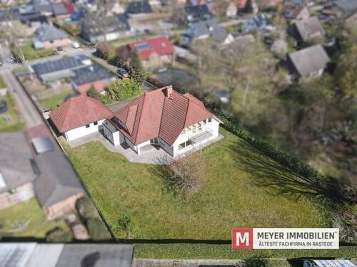 Objektansicht - 6 Zimmer Mehrfamilienhaus, Wohnhaus zum Kaufen in Rastede