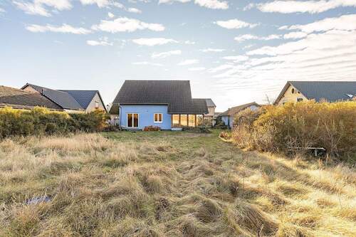 Blick auf das Haus vom Garten aus - 5 Zimmer Einfamilienhaus in Planebruch