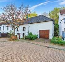 PHI AACHEN - Raumwunder mit großzügigem Süd-Garten und Garage im Herzen von Laurensberg!