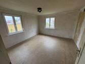 Schlafzimmer EG links - 
