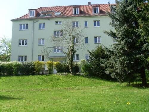 Rückansicht - 1-Raum-Wohnung mit separater Wohnküche und Laminat