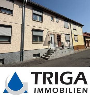 Bild 1 - Wohlfühllage gesucht? Charmantes Reihenmittelhaus in angenehmer Wohnlage.