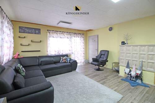 OG Wohnzimmer - 9 Zimmer Mehrfamilienhaus, Wohnhaus zum Kaufen in Weidenstetten