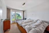 Schlafzimmer mit Terrassenaustritt - Sockelgeschoss - 