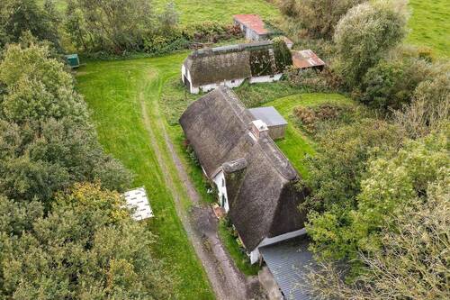 Blick über das Grundstück - Einfamilienhaus mit 170,00 m² in Garding / Borsthusen zum Kaufen