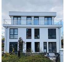 Neubau-Erstbezug in Rangsdorf: Stilvolle Doppelhaushälfte mit umlaufender Dachterrasse