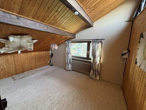 Schlafzimmer im Dachgeschoss - 