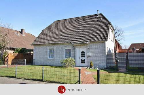 Haus kaufen in Delmenhorst – H & T Immobilien - Traumhaft - Einfamilienhaus mit Garage und Südwest-Garten in Top-Lage!