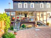 Wintergarten und Hauseingang - 