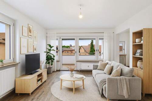 Wohnzimmer (gestaged) - Etagenwohnung mit 73,80 m² in Leonberg zum Kaufen