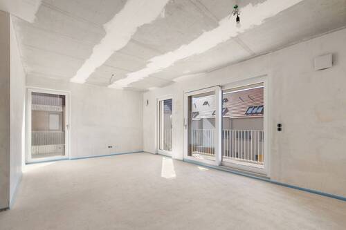 Wohn-und Esszimmer mit Zugang zum Balkon - Etagenwohnung mit 73,00 m² in Freckenfeld zum Kaufen