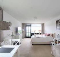 Kleiner Traum am Meer in Süssau: Charmantes Appartement mit Meerblick, Balkon und PKW-Stellplatz