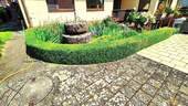 Garten mit Brunnen - 