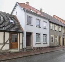 4-Zimmer-Reihenmittelhaus in Neukalen mit Garten, Garage, Werkstatt & Ausbaureserve im DG