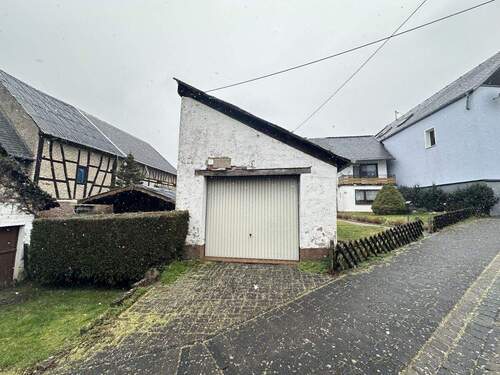 Einzelgarage - Einfamilienhaus mit 135,00 m&sup2; in Womrath zum Kaufen
