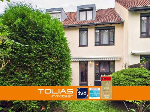 Titelbild - Familienfreundliches Split-Level-Haus in Stammheim: unverbaubarer Grünblick mit Stellplatz & Garage